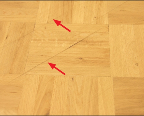 Marks Left in Wood Floor by Old, Worn Sanding Drum